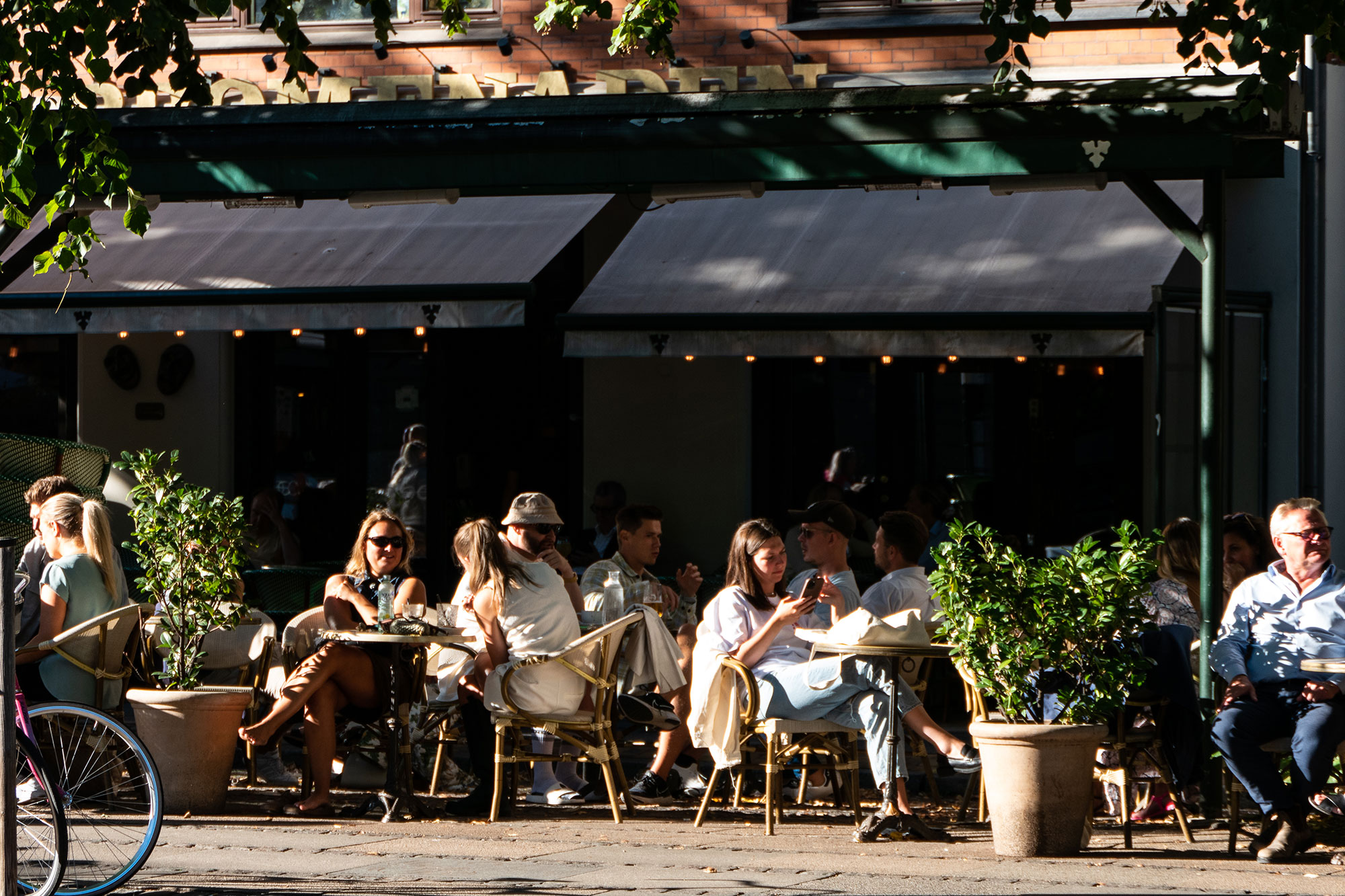 People sat outside a bistro