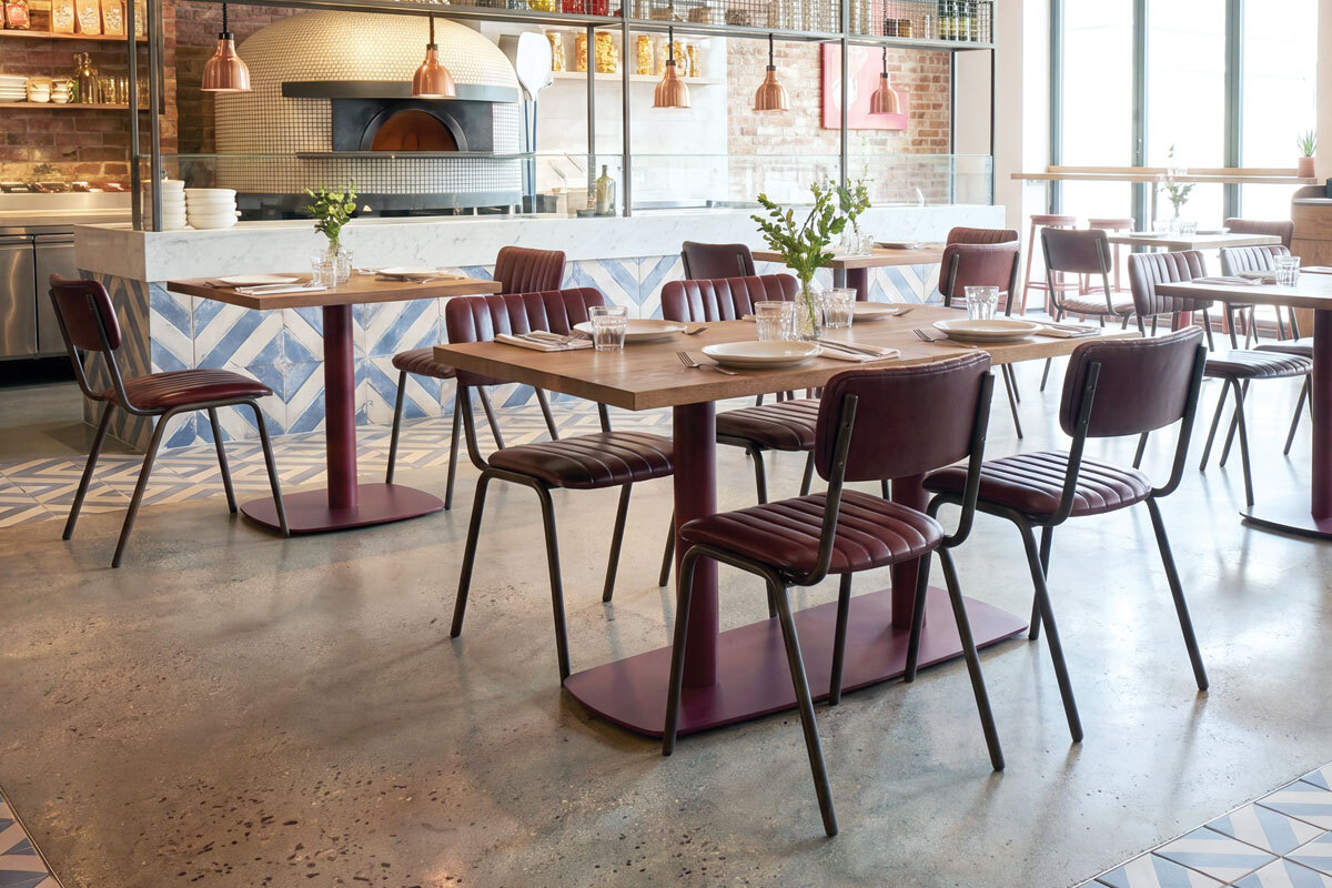 Casual restaurant interior with commercial stackable dining chairs Casual restaurant interior with commercial stackable dining chairs