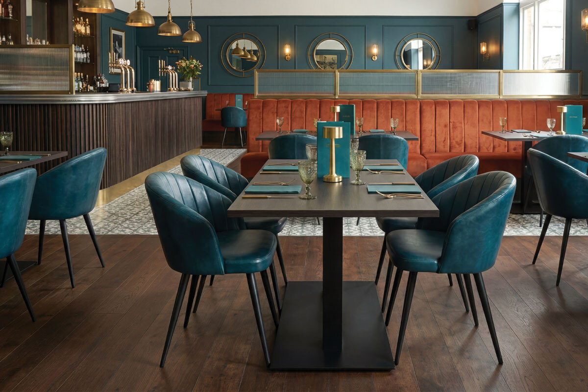 Restaurant with upholstered non-stackable dining chairs Restaurant with upholstered non-stackable dining chairs