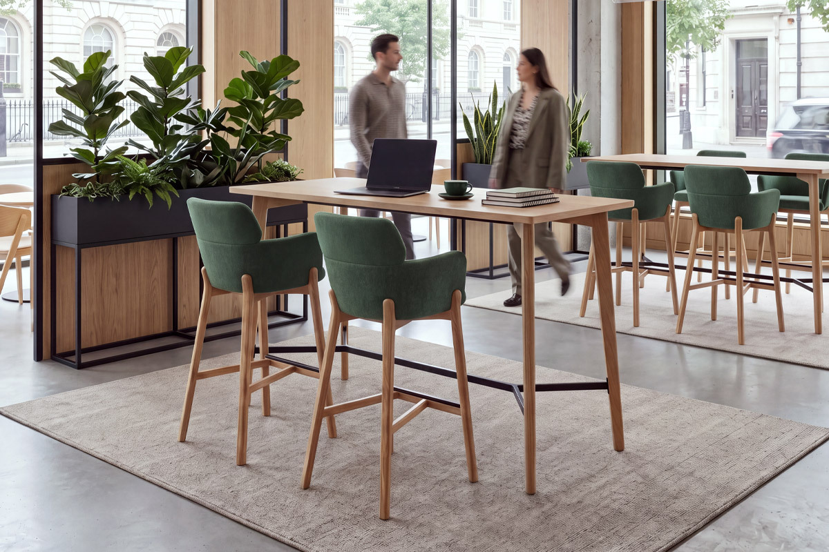 Workspitality poseur tables and high stools in a modern reception area Workspitality poseur tables and high stools in a modern reception area